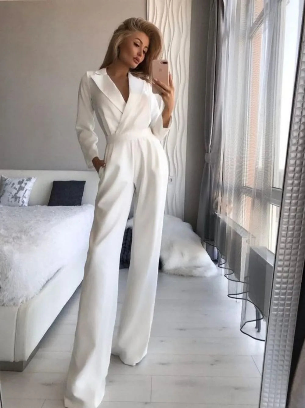 Dakota - Stilfuld Lang Jumpsuit med Krave og Brede Ben for et Raffineret og Moderne Look