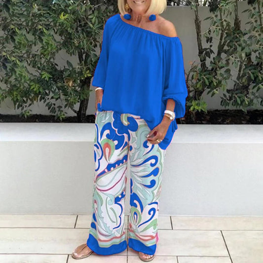 Women's Set - Off-Shoulder Blouse with Pom-Pom - 3/4 Sleeves - Wide Pants with Print